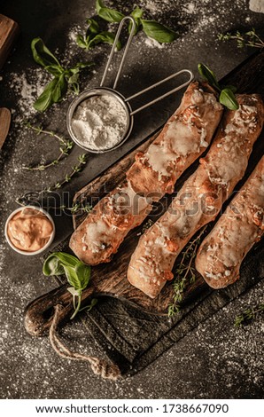 Delicious pastry stuffed with sharp cheese with cheese dip
