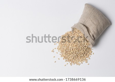 Barley grits/goats isolated on white 