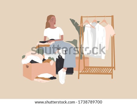 A woman is folding clothes. Second Hand donation box bin. Art in Scandinavian style. Colored vector illustration in flat cartoon style. Big clothing rack. Young girl sorting things