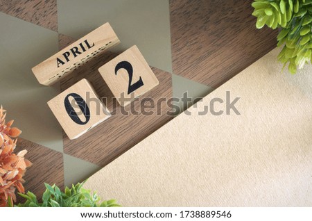 April 2, Number cube design in natural concept.