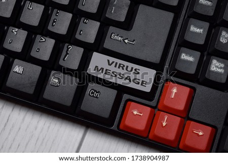 Virus Message write on keyboard isolated on laptop background