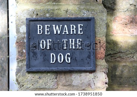 Beware of the dog sign photographed in London