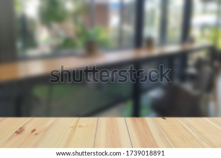 Empty Wood Plate Top Table On Abstract Blurred Background Of Cof