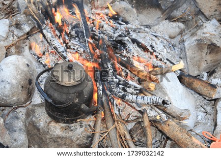 tea cooked on wood fire