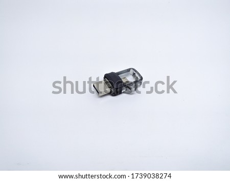 Small black flashdisk isolated on white background