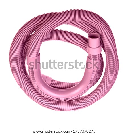 Rolled up pink washing machine drain hose isolated on white background