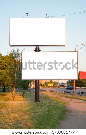 Advertising billboard metal, large horizontal. Billboard mockup outdoors. With clipping path on screen.