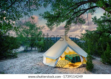 Luxury Tent at a Campsite at Sunset Royalty-Free Stock Photo #1739114249