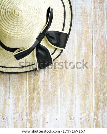 hat on a wooden background with copy space