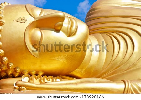 Face of Reclining buddha at thailand. Generality in Thailand, This photo is public domain or treasure of Buddhism, no restrict in copy or use. No any trademark or restrict matter in this photo.