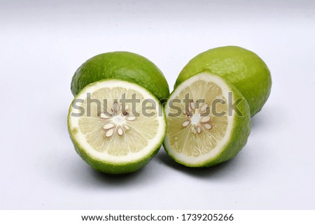 Close up photo of lemon and lemon slices.