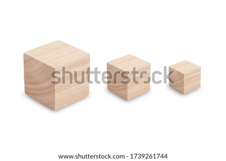 Wooden cube blocks in different size with beautiful wooden textured isolated on white background with Clipping path