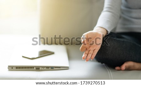 woman clam play yoga for break time after work load working at home, social stop or disconnect technology concept. Royalty-Free Stock Photo #1739270513