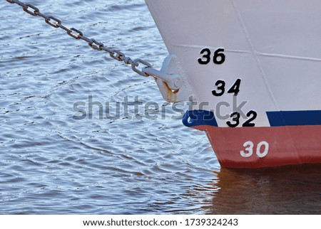shadows highlights and numbers on the bow of the ship