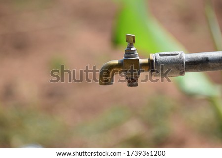 Braze drinking water tap in village 