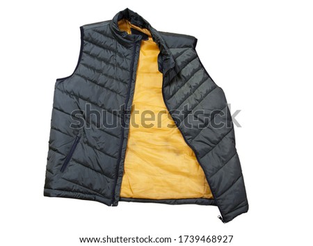 Vest isolated on the white background, green vest top view on a white background. A warm green waistcoat is on white.