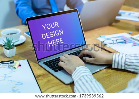 Computer laptop mockup white background on desk. Laptop blank screen with clipping path for your design here. Royalty-Free Stock Photo #1739539562