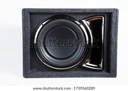 Active subwoofer with built-in amplifier for installation in the car.