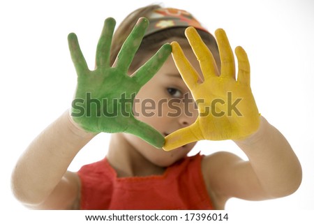 little girl with her hands painted isolated on white background