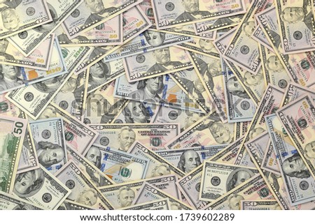 Many one hundred and fifty dollar bills on flat background surface close up. Flat lay top view Royalty-Free Stock Photo #1739602289