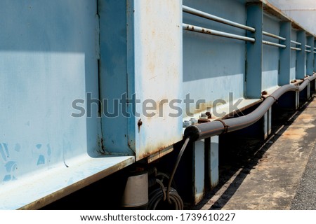 Steel beside structure of truck scales blue color.