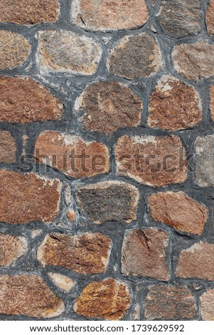 view from above on texture of wall of large stones.