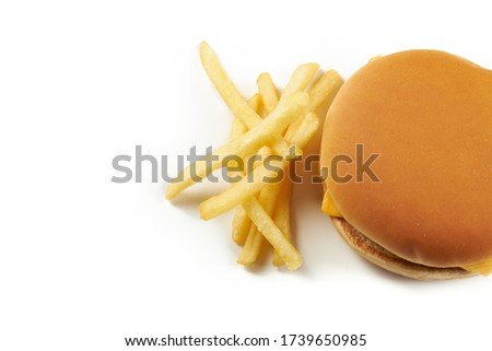 a fresh tasty cheeseburger or burger with fries stack isolated on a white background. fast food.