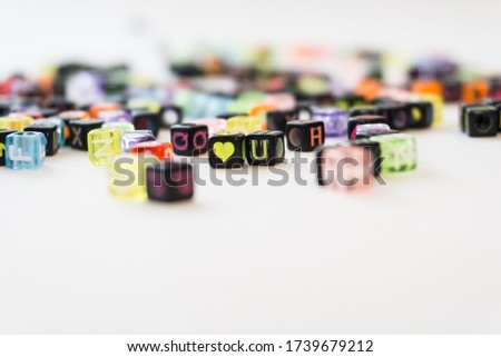 Colorful alphabets beads on white background. Love you from cubes. Valentines Day. different colors with letters, concept image