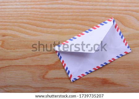 Envelope paper on a wooden board