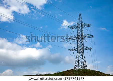 Tower electric on the abstract sky background

