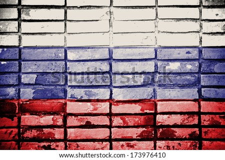 Grunge Russia flag on old brick wall 