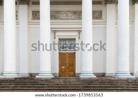 Doorway and architectural colonnade in front of cathedral in Helsinki