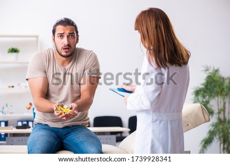Male diabetic patient visiting young female doctor