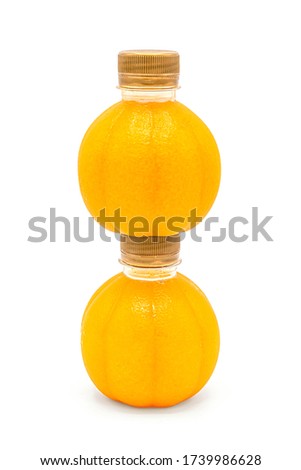 Plastic bottles of orange juice isolated on white background
