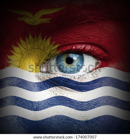 Human face painted with flag of Kiribati
