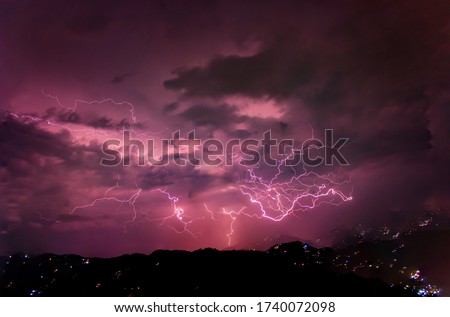 A Photograph Of A Continuous Lightning Over The Mountains Of Kashmir.