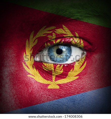 Human face painted with flag of Eritrea