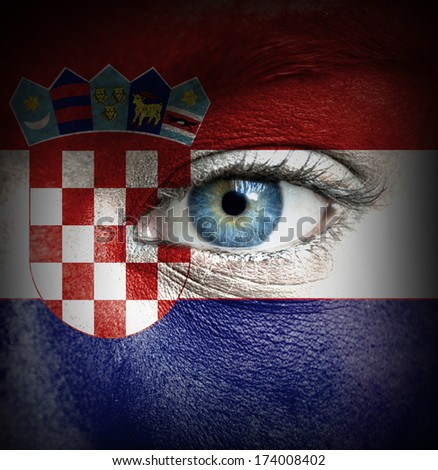 Human face painted with flag of Croatia