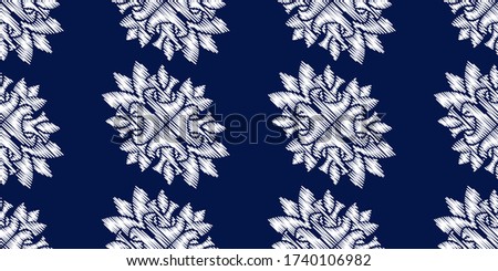 Uzbek ikat silk fabric pattern, motif ethnic indigo blue and white colors. Tite repit pattern