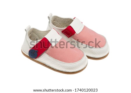 genuine leather baby shoes, isolated on white background, stock photography