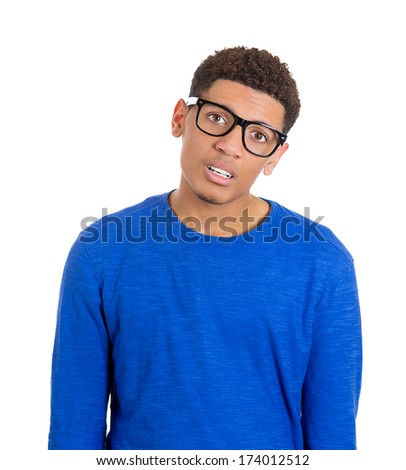 Closeup portrait of annoyed sad skeptical, unhappy young man, student bothered by parents, teacher, coach, isolated on white background. Negative human emotions, facial expressions, attitude, reaction