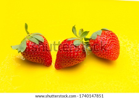 Red strawberries, rich in vitamins, eaten raw, in jam, in ice cream, few calories, sweet taste.