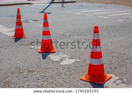 Road construction signs on asphalt