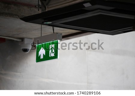 fire exit electric sign hang on ceiling.
