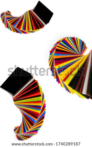 spiral Stack of different colours Cast Acrylic Sheet on white background