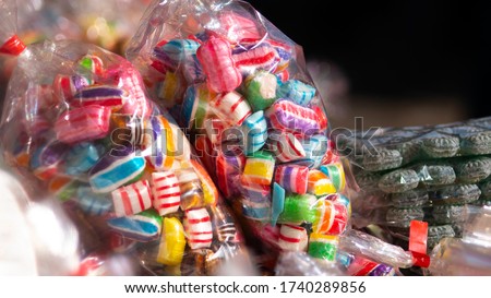 Colorful candies in plastic packaging. Royalty-Free Stock Photo #1740289856