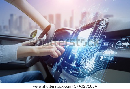 futuristic vehicle and graphical user interface(GUI). intelligent car. connected car. Internet of Things. Heads up display(HUD).