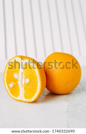 Juicy orange on a light background