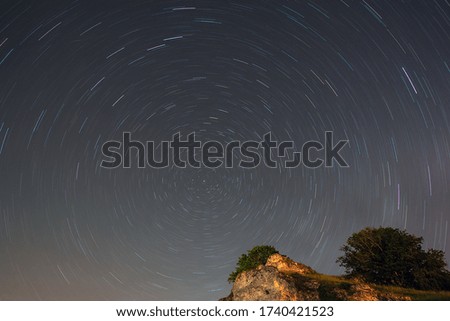 Night landscape with traces of stars.