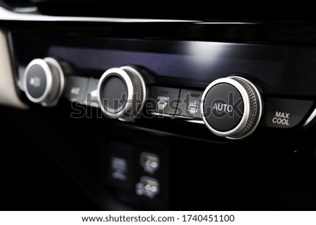Close up Air conditioner button on car. comfortable car or system in car concept.